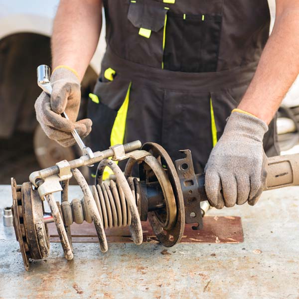 Damaged Strut Boot? Should You Repair Or Replace?